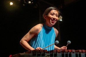 Performer playing xylophone