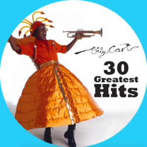 Circular image within blue border. The Oily Cart logo is above text that reads '30 Greatest Hits'. A performer wearing a big quilted orange skirt with an orange shirt and hat with orange tubes sticking out holds a trumpet and smiles at the camera.