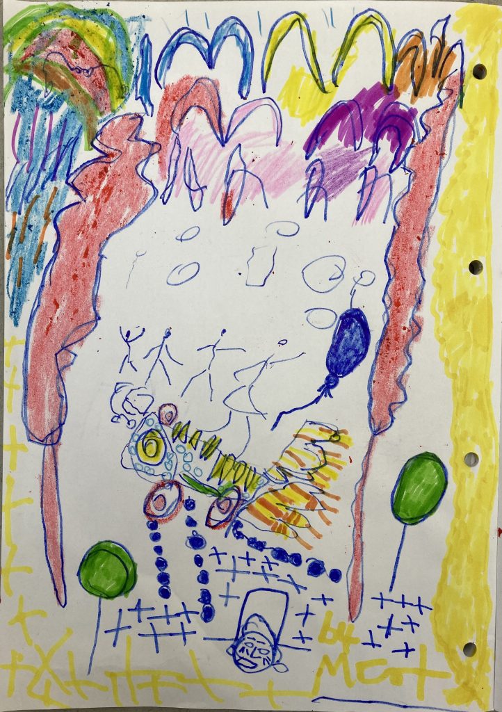 Colourful drawing of the Finale by Mark. In the centre is the cart, with people dancing around it. There are balloons, streamers and big red feathers surrounding it, and a rainbow sparkling waterfall coming from it. At the bottom is a boy smiling, enjoying the finale. To it's right, Mark has signed 'by Mark' in yellow pen.